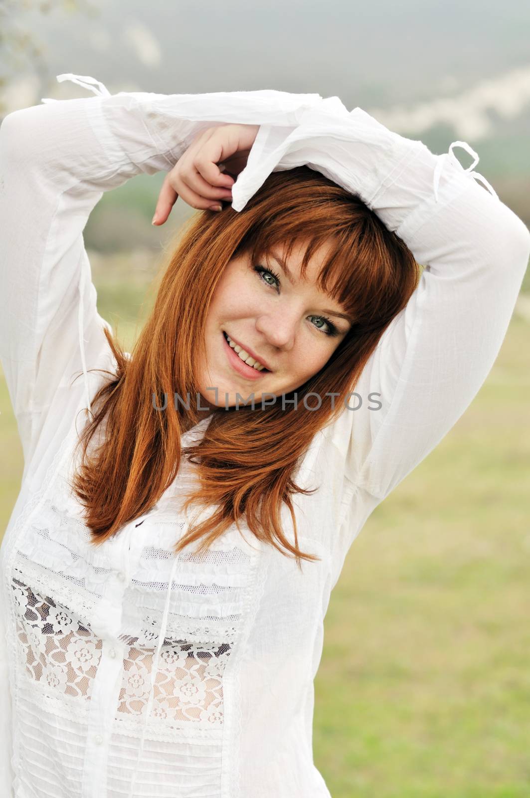 redheaded happy girl outdoors happy with first days of fall