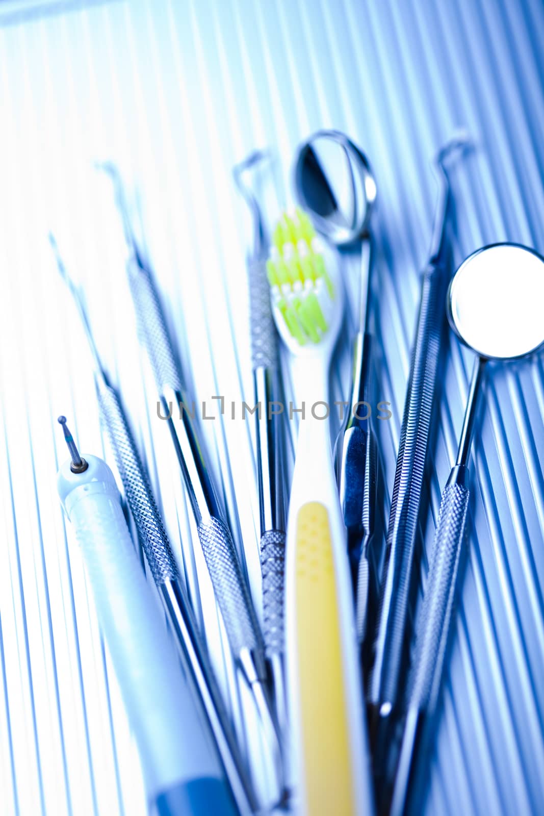 Close-up Dental Instruments, bright colorful tone concept by JanPietruszka