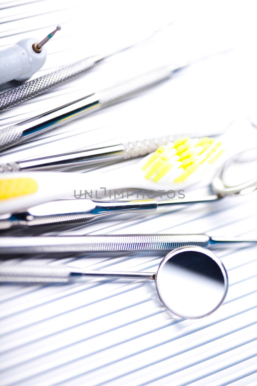 Dentist equipment on blue background