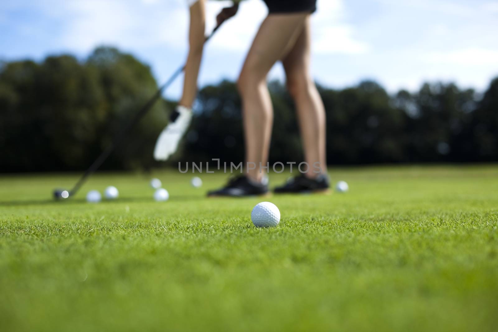 Woman playing golf on field, bright colorful vivid theme