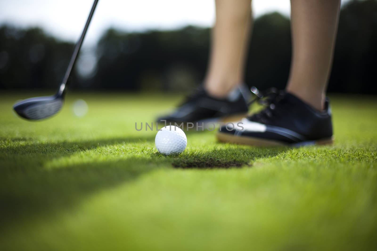 Woman playing golf on field, bright colorful vivid theme