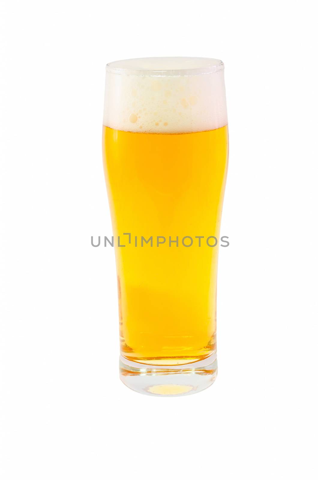 Large glass filled with beer against white background.