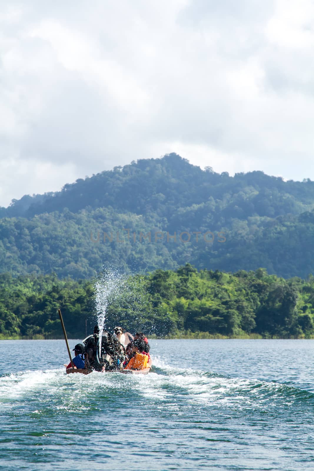 Lake mountain with boat and blue sky