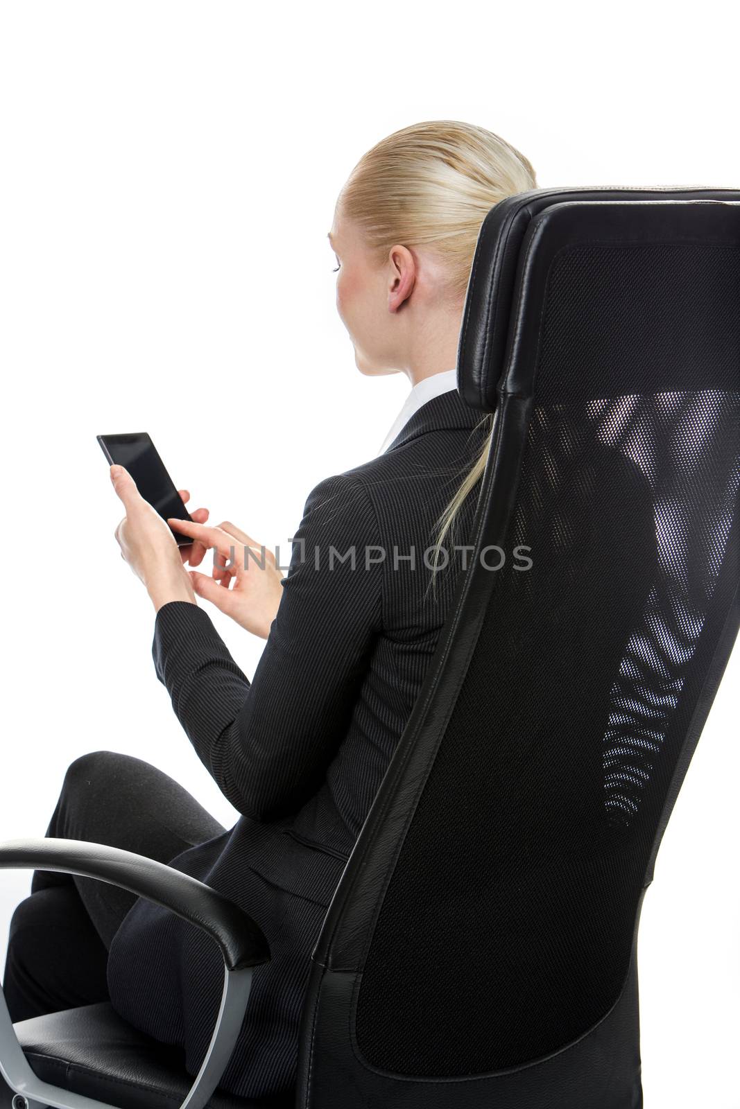 woman on a chair with mobile phone
 by Flareimage