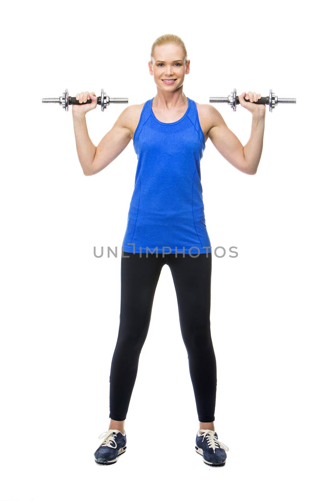 blonde woman wearing fitness clothing exercising with weights