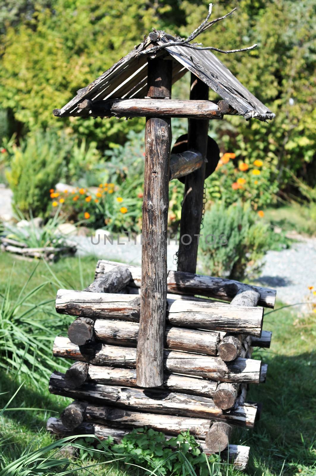 wooden well by Reana
