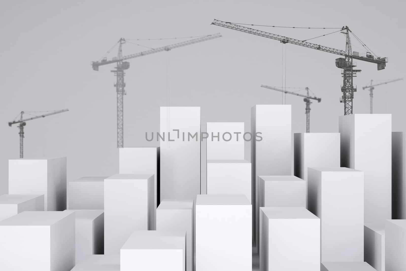 White cubes with wire-frame tower cranes on gray background. Cropped image. Concept of urban construction