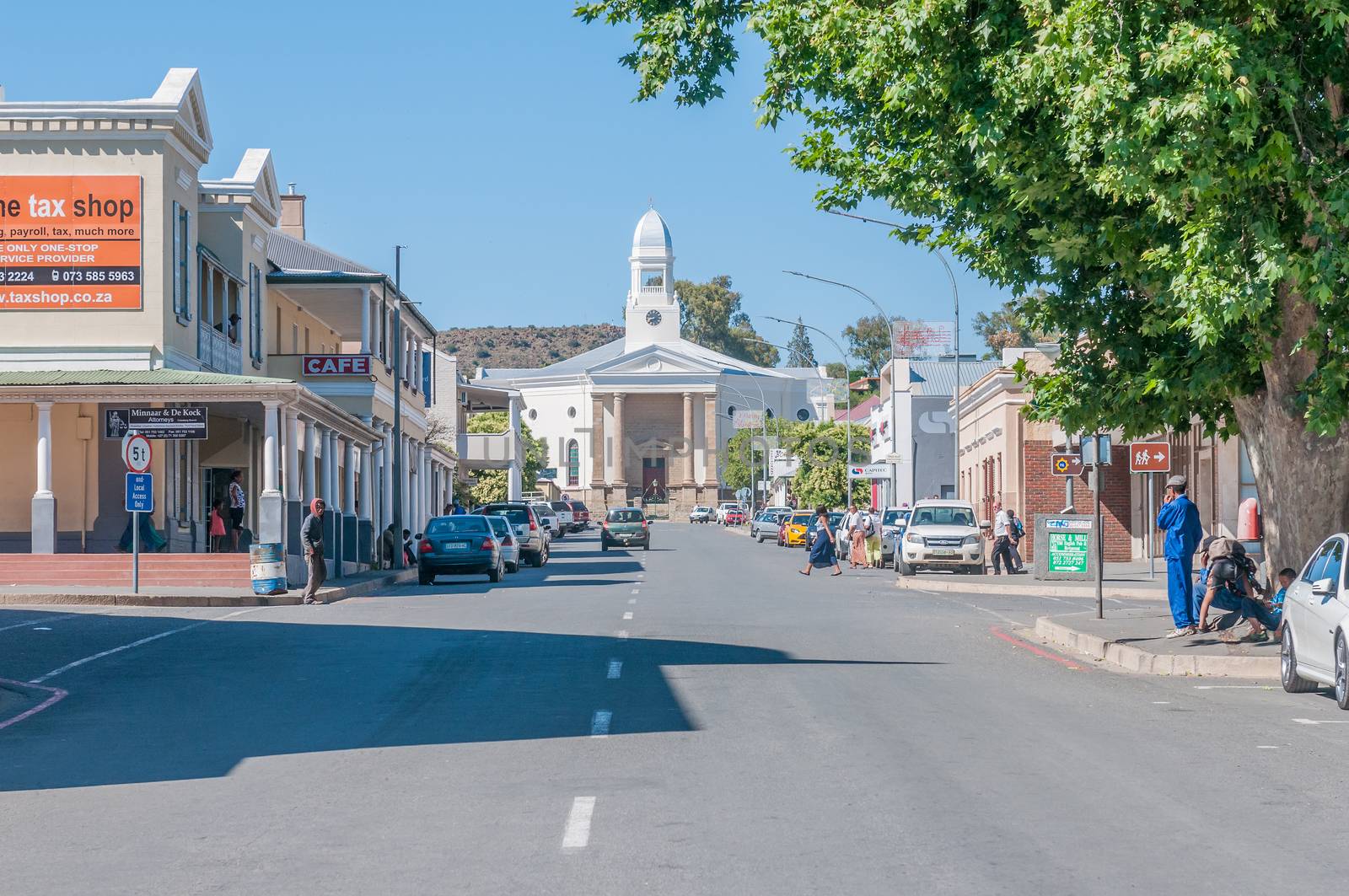 COLESBERG, SOUTH AFRICA - DECEMBER 1, 2014: Early morning street scene with ending the Dutch Reformed Church