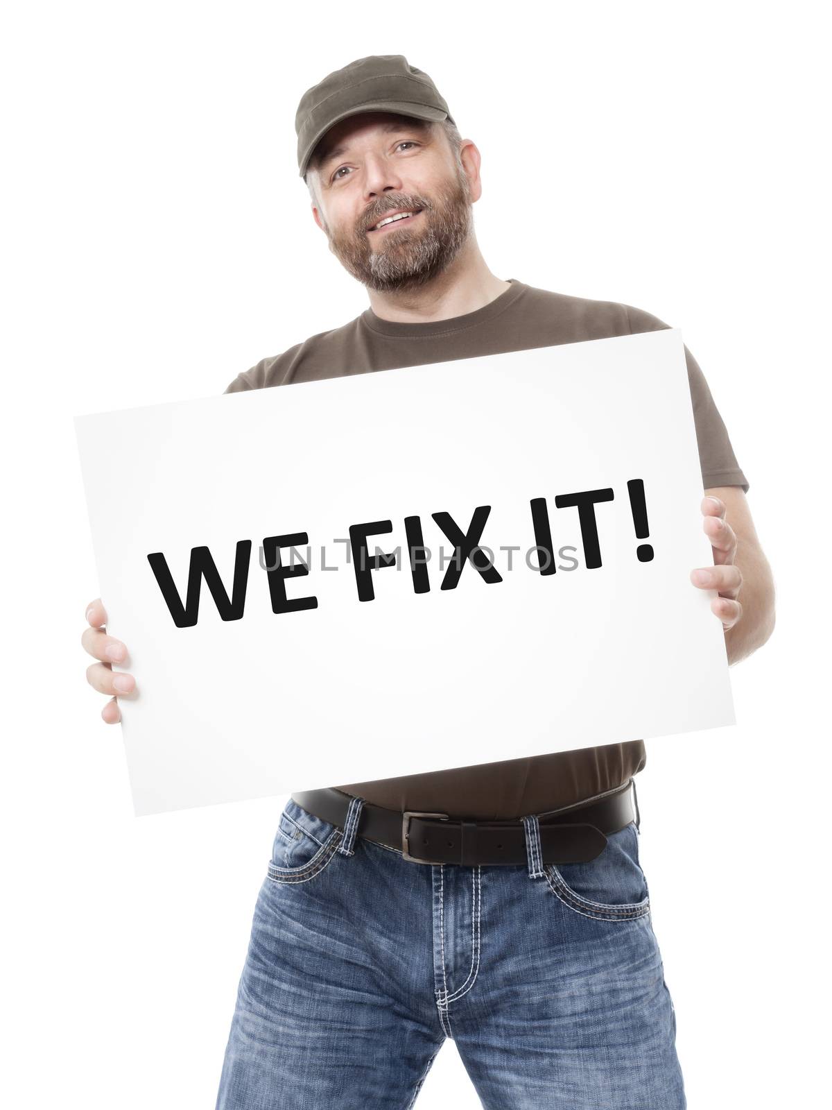 A bearded man holding a white board with the message we fix it