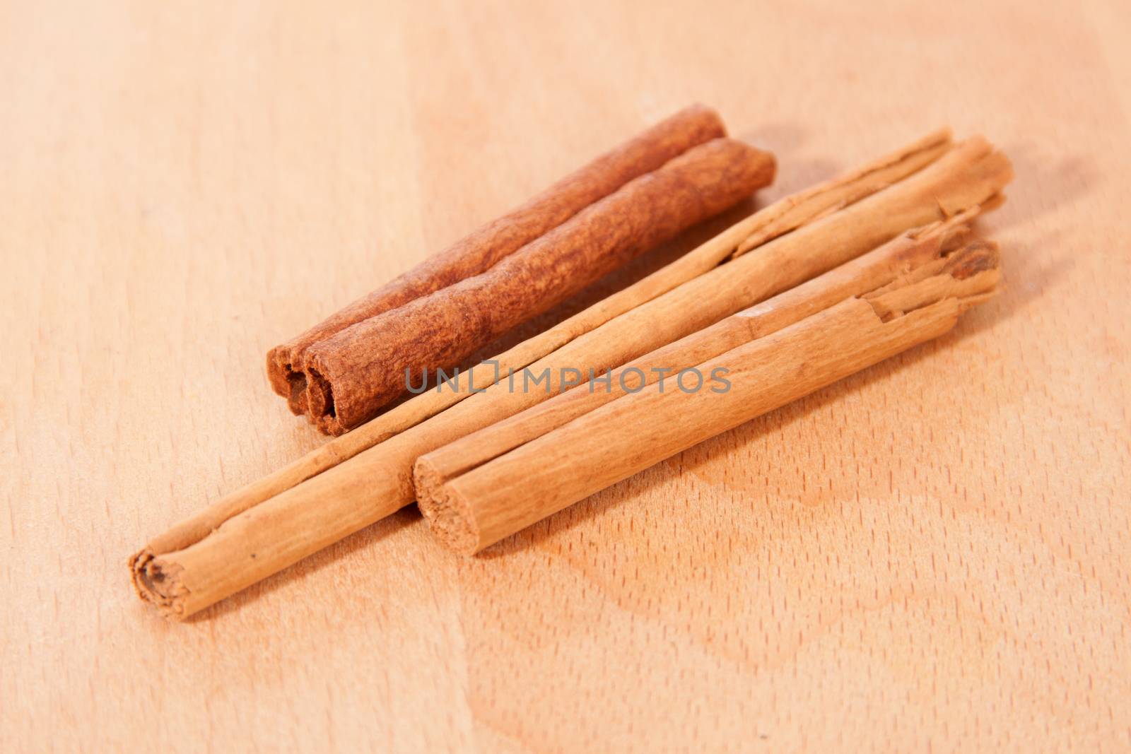 Cinnamon bark on a wooden table top