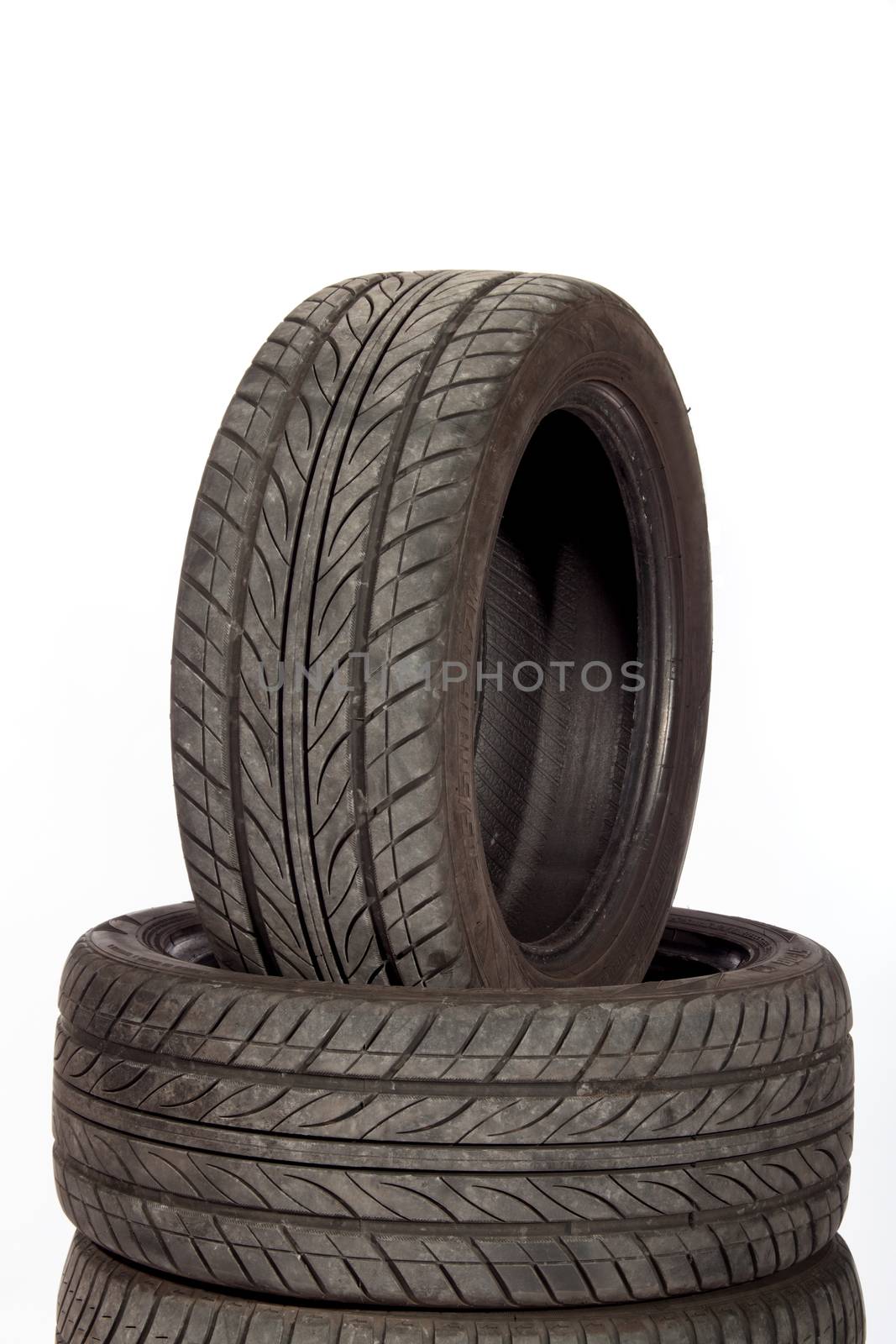 Used, dirty tires isolated on white