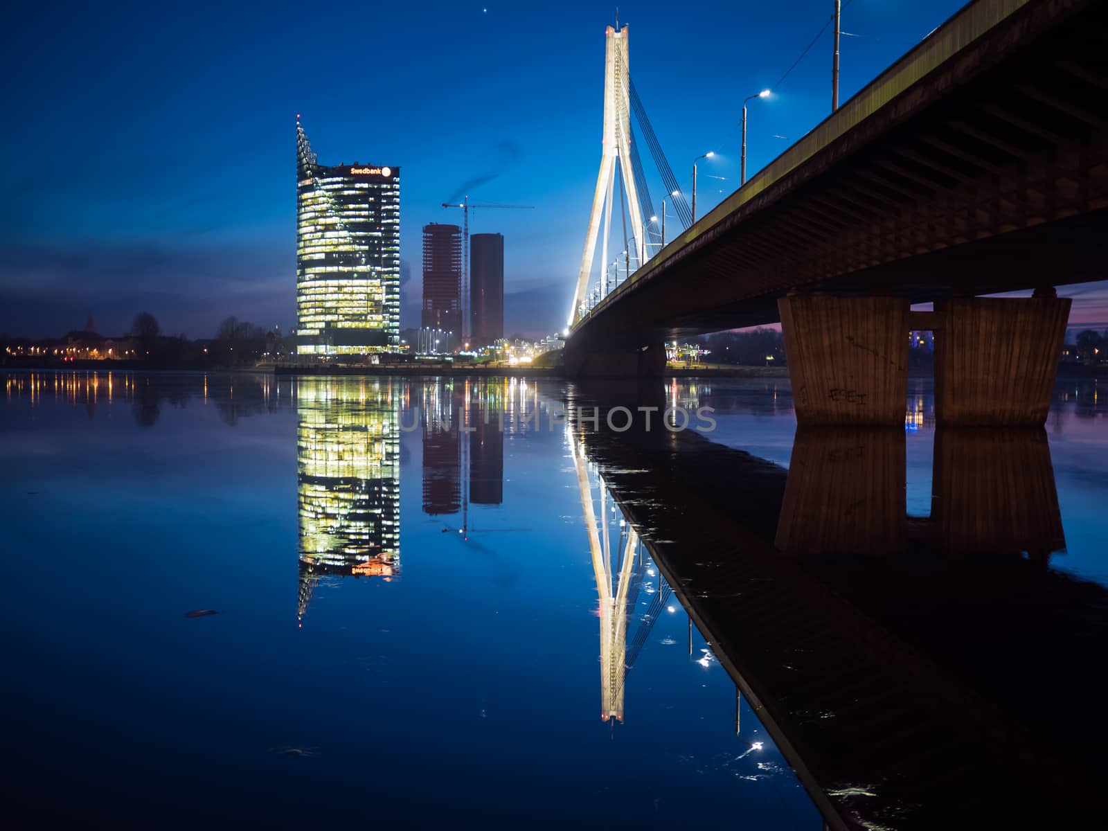 View of Riga river and Vansu Bridge in evening