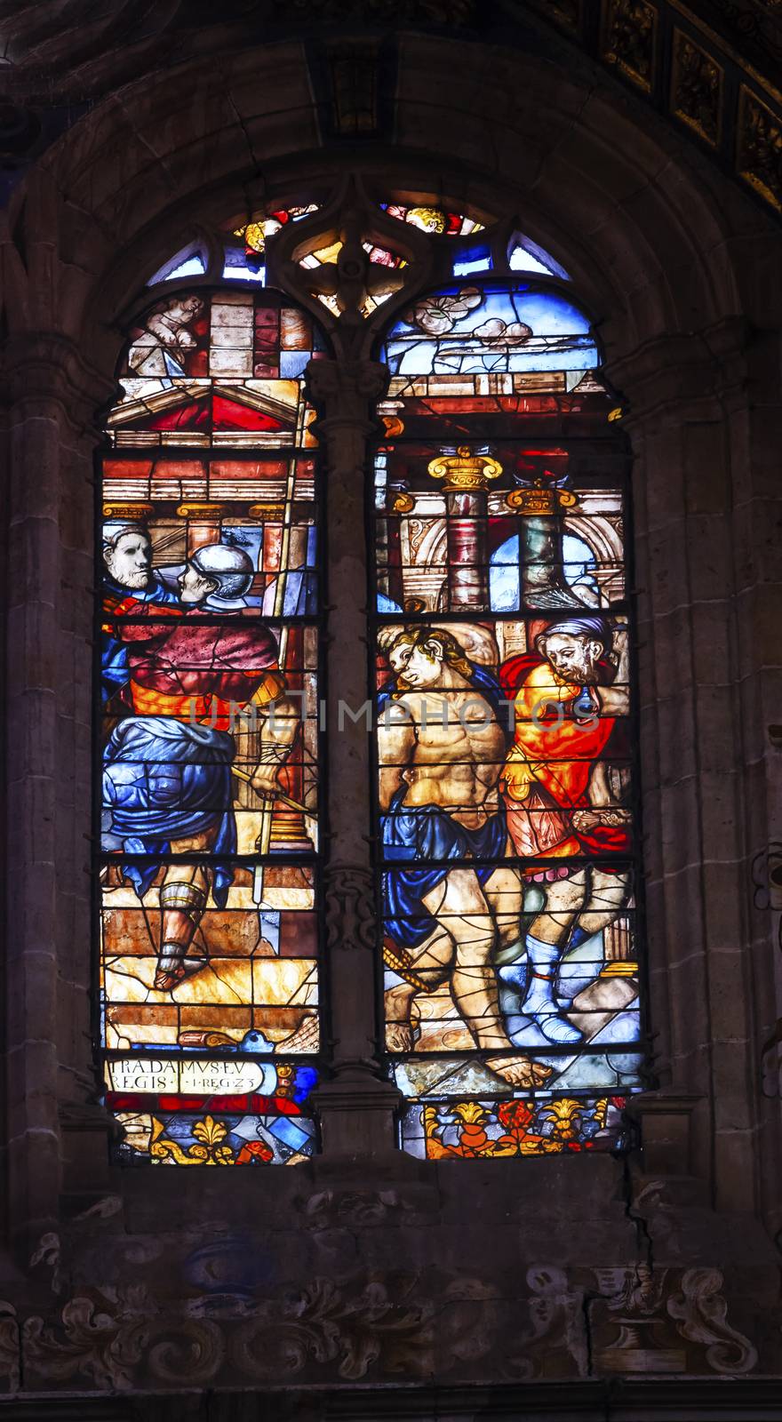 Jesus Christ Soldiers Stained Glass Salamanca New Cathedral Castile Spain. The New and Old Cathedrals in Salamanca are right next to each other.  New Cathedral was built from 1513 to 1733 and commissioned by Ferdinand V of Castile, Spain.