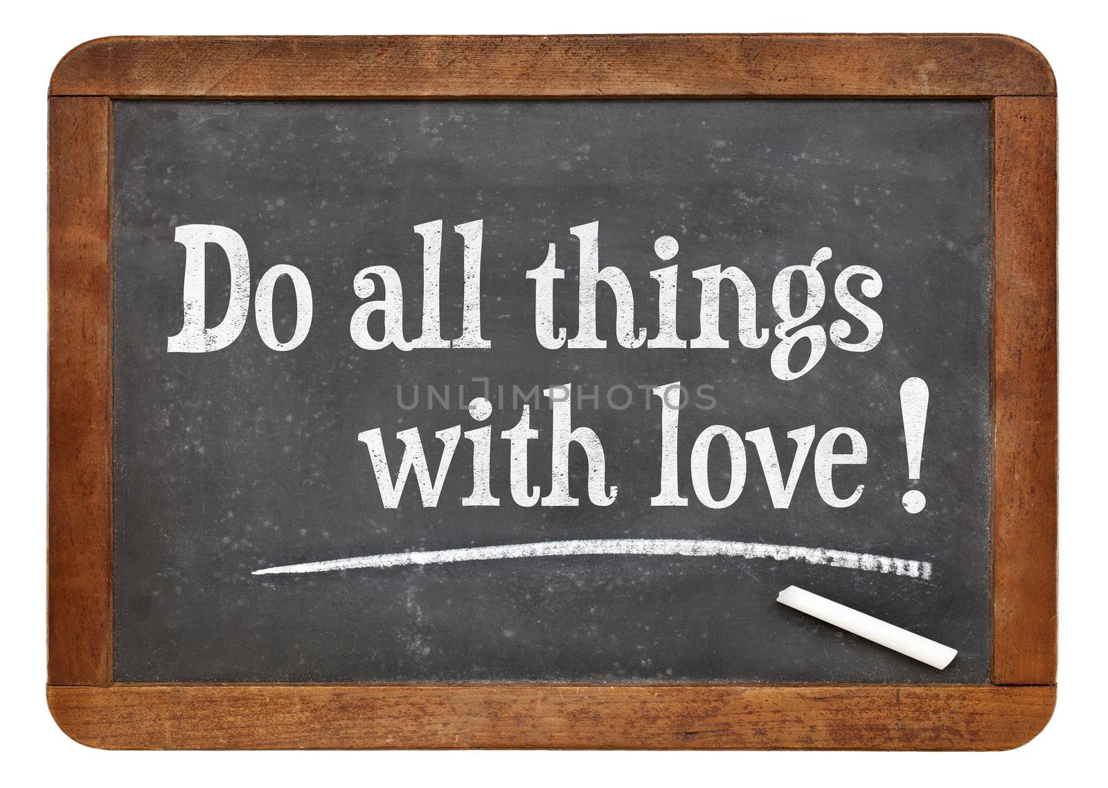 Do all things with love - positive words on a vintage slate blackboard