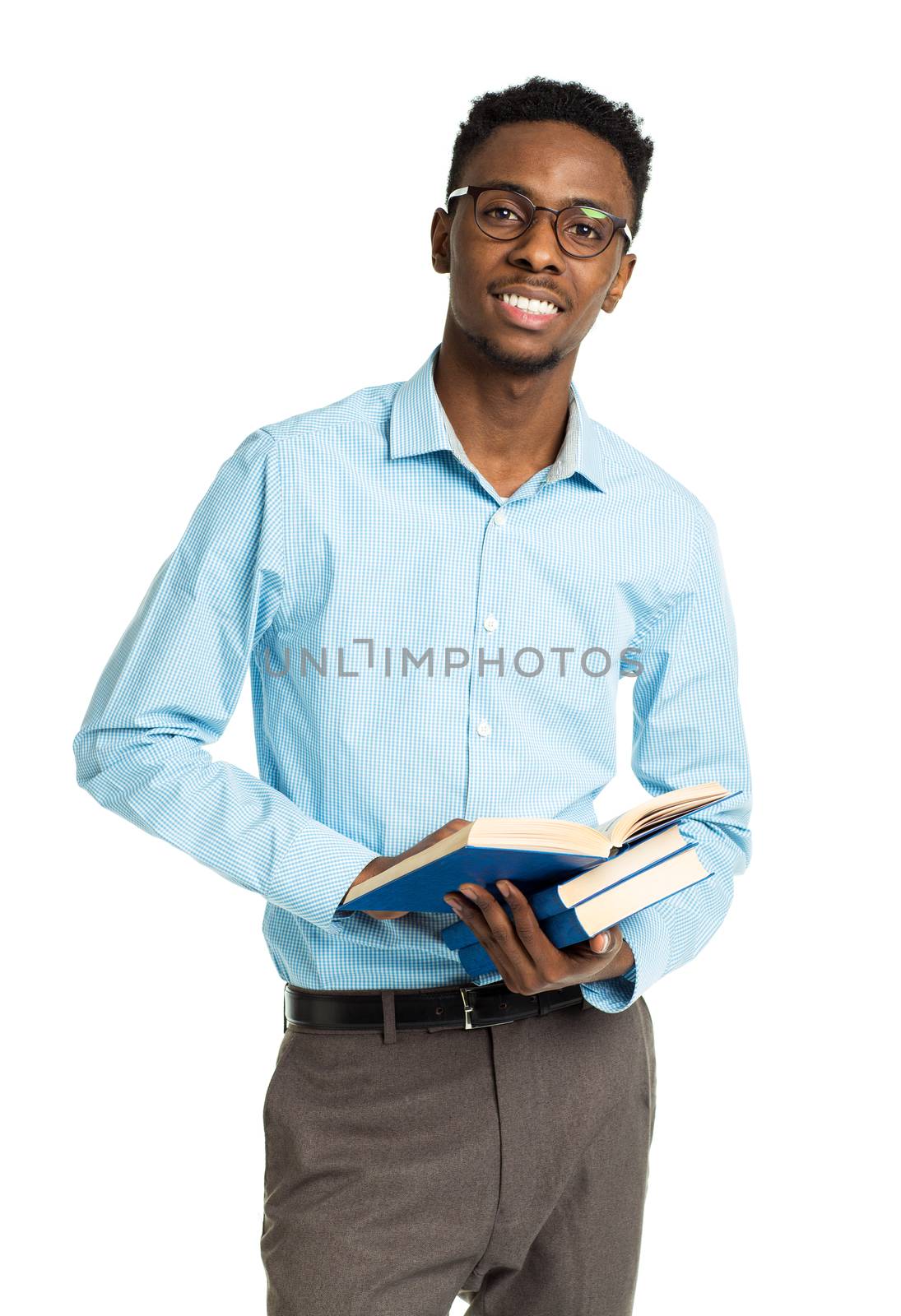 Happy african american college student with books standing on wh by vlad_star