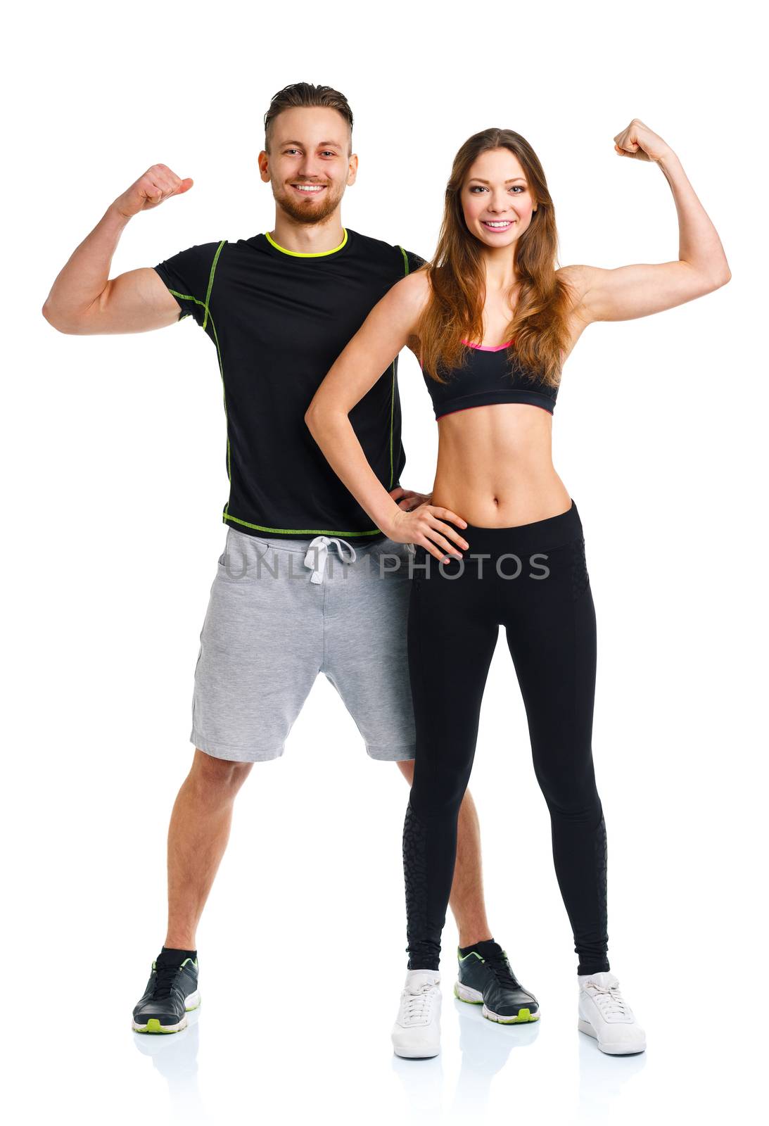 Sport couple - man and woman after fitness exercise on the white by vlad_star