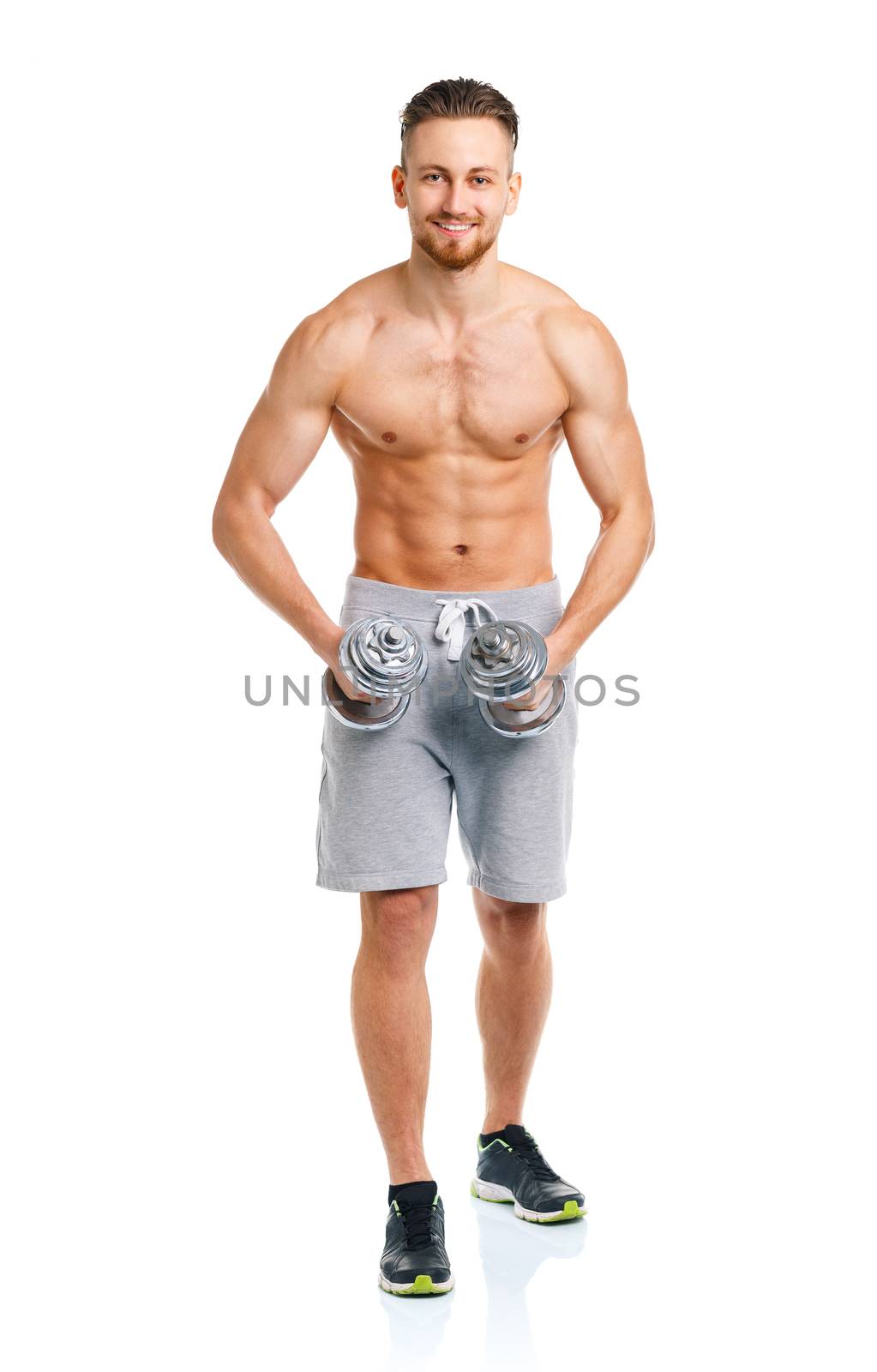 Happy athletic man with dumbbells on the white background