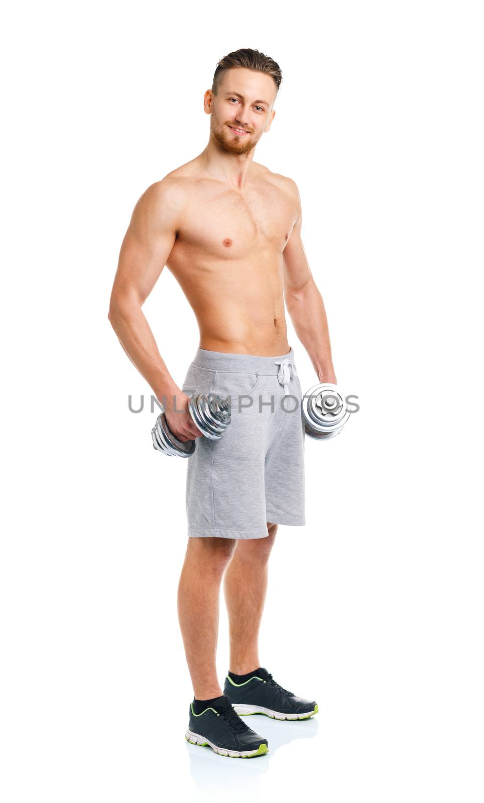 Happy athletic man with dumbbells on the white background