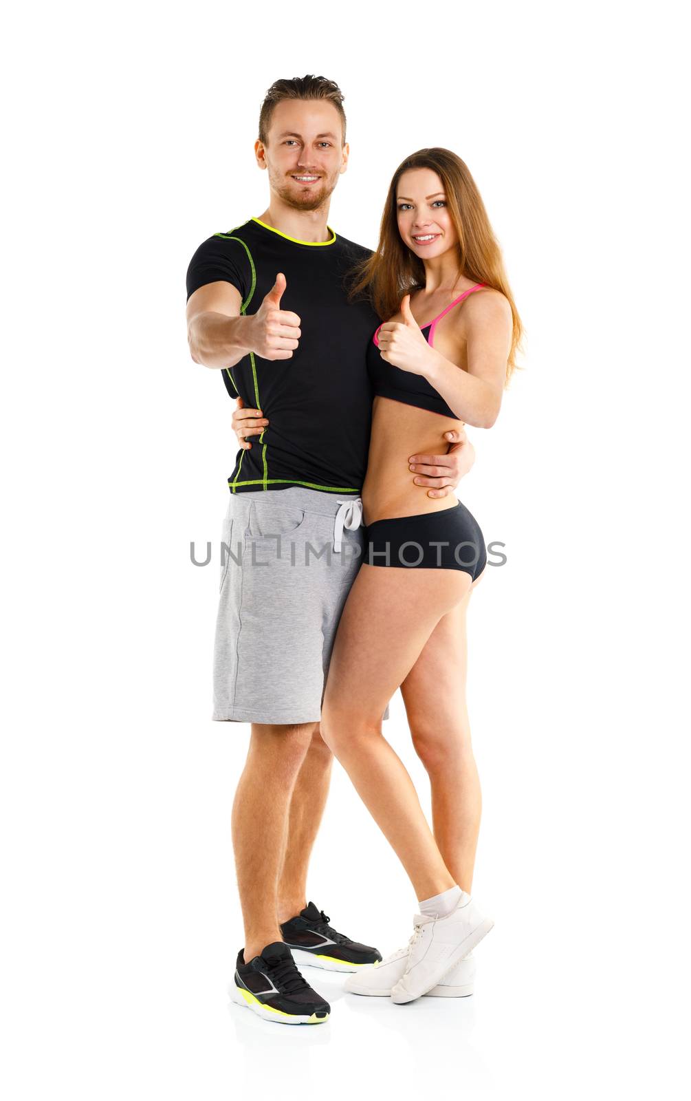 Athletic man and woman after fitness exercise with a finger up on the white background