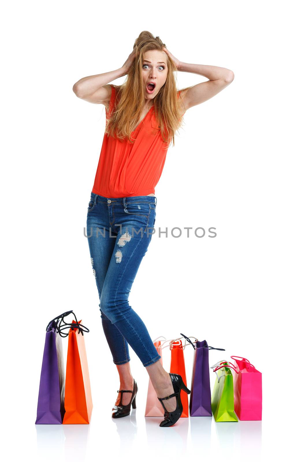 Happy lovely woman with shopping bags over white by vlad_star