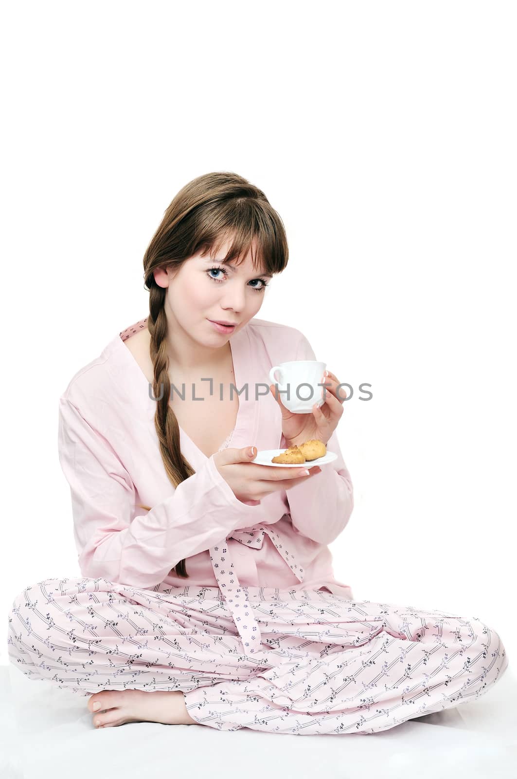 longhaired young woman drinking morning coffee