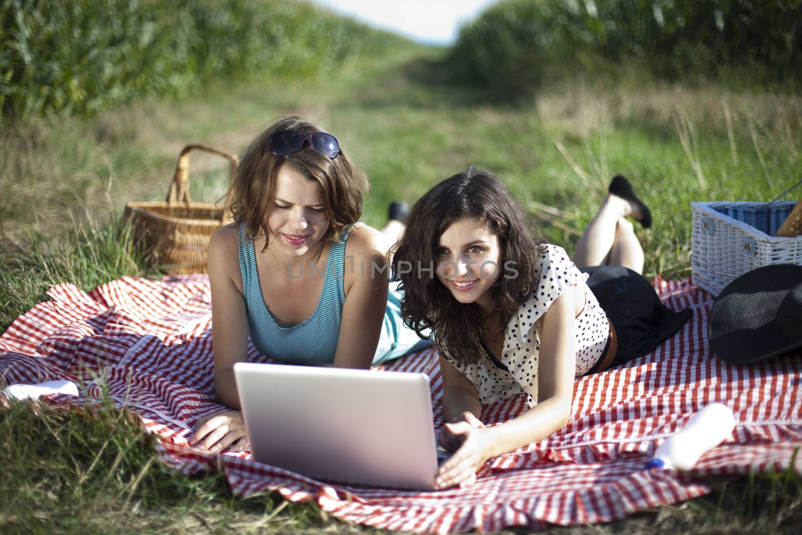 Young women on nature picnic