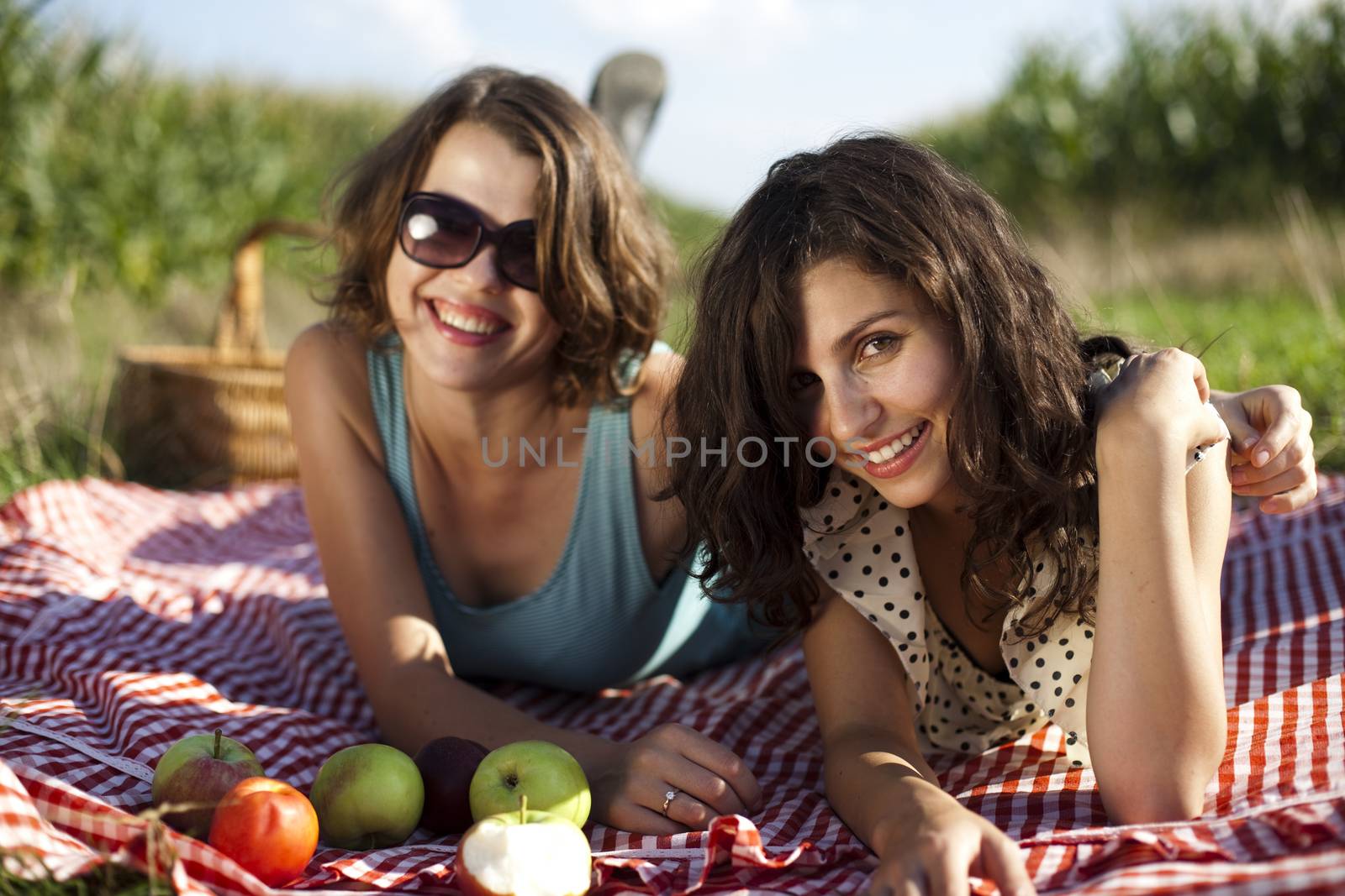 Young women on nature picnic by JanPietruszka
