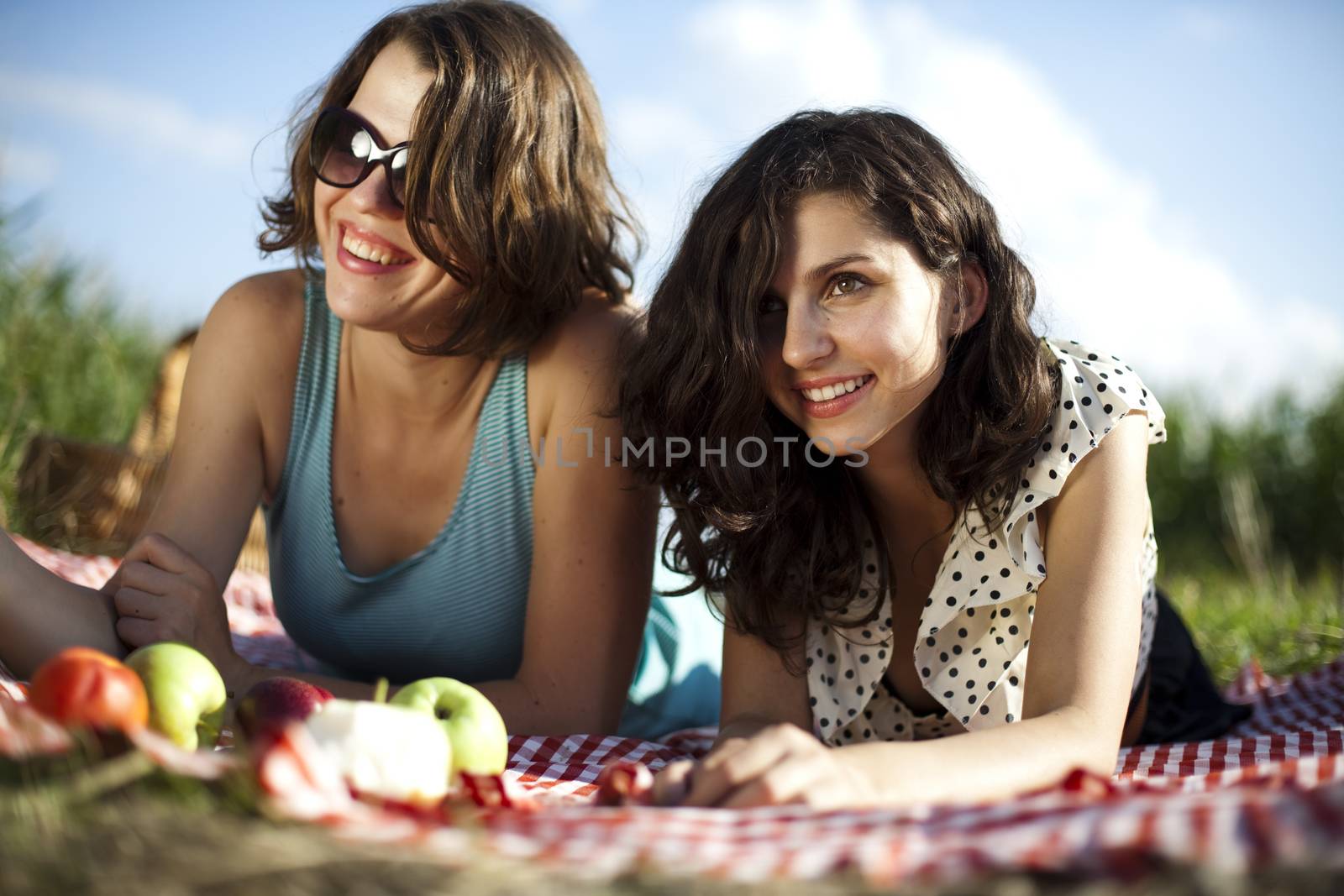 Young women on nature picnic by JanPietruszka