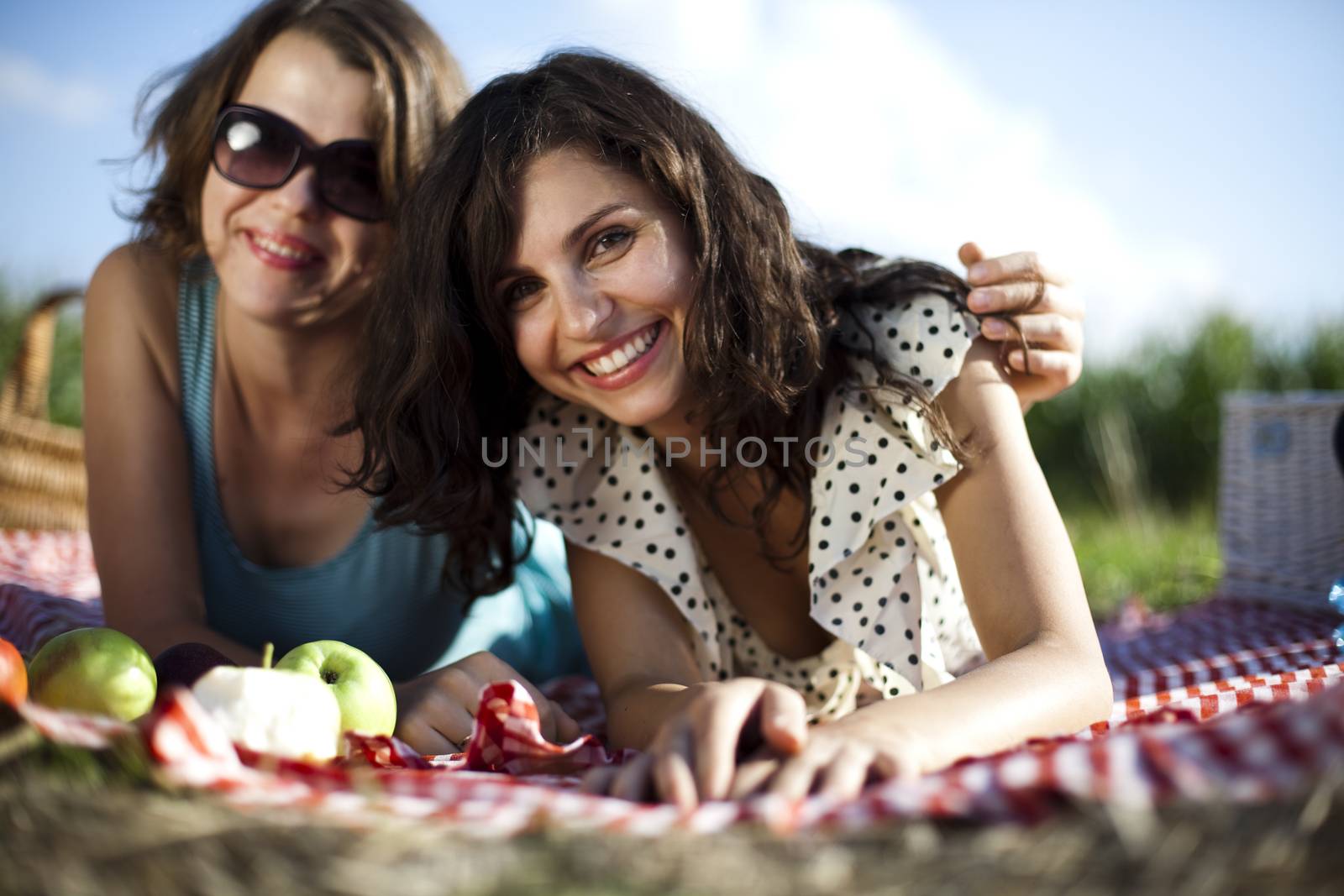 Young women on nature picnic