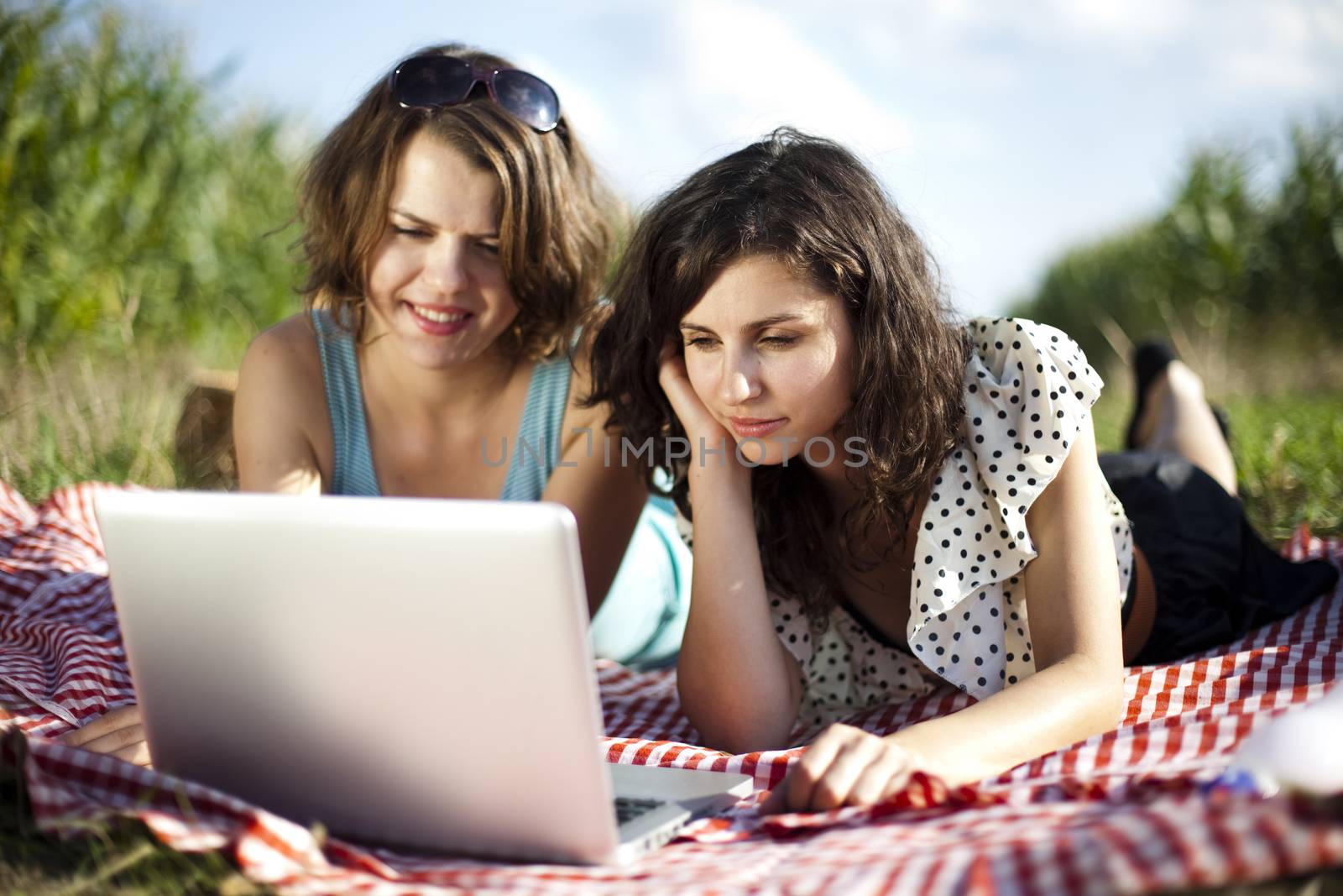 Young women on nature picnic