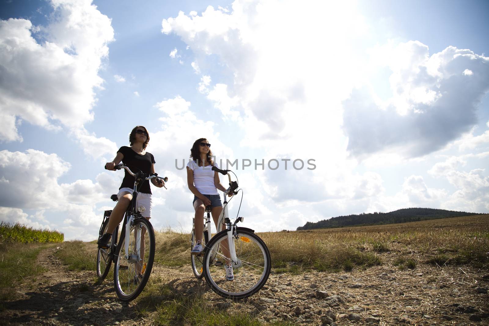 Girl with a bicycle enjoying