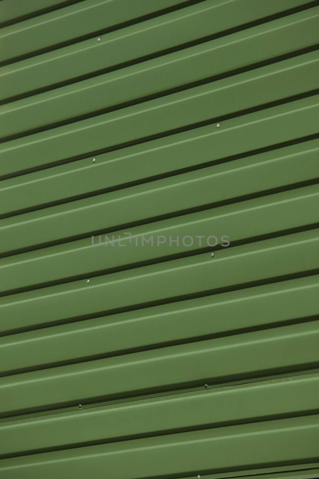 Close up of Green Corrugated Iron Full Frame by gemenacom