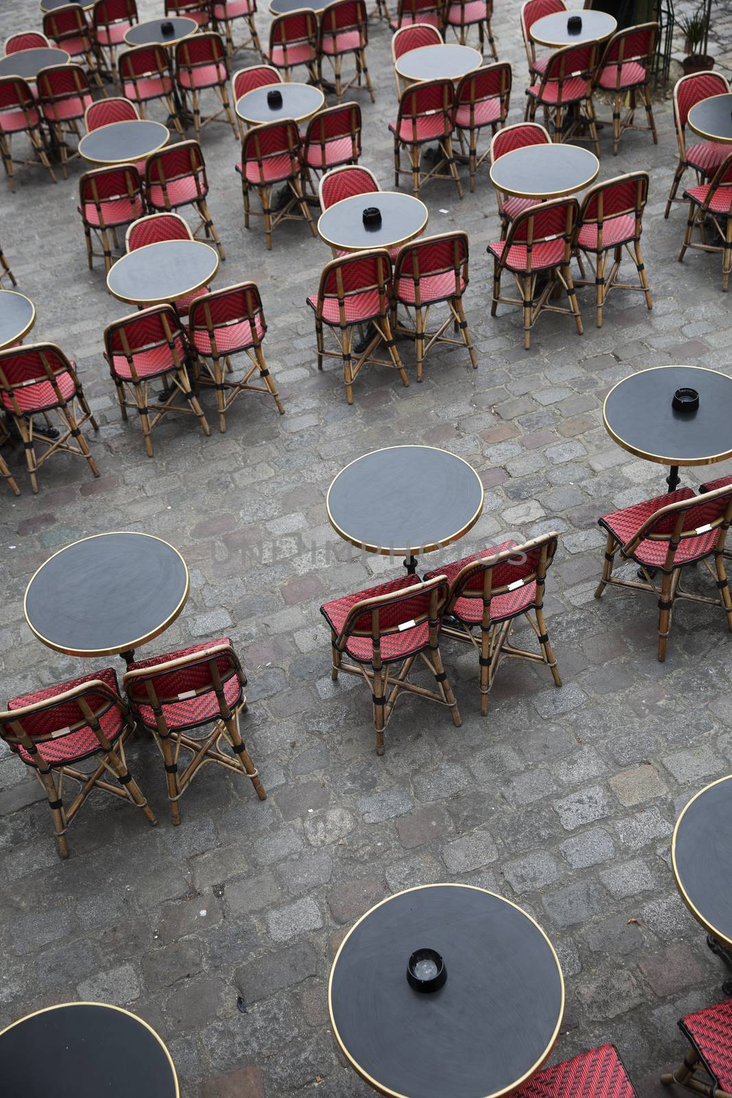 Cafe in Paris with no people from high angle view by gemenacom