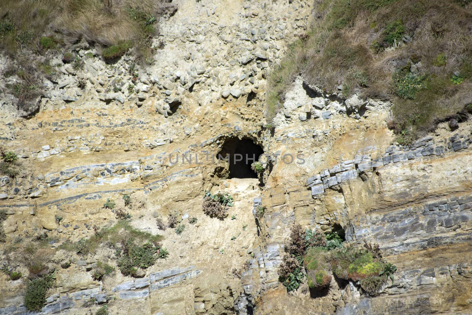 ancient cliff cave entrance by morrbyte