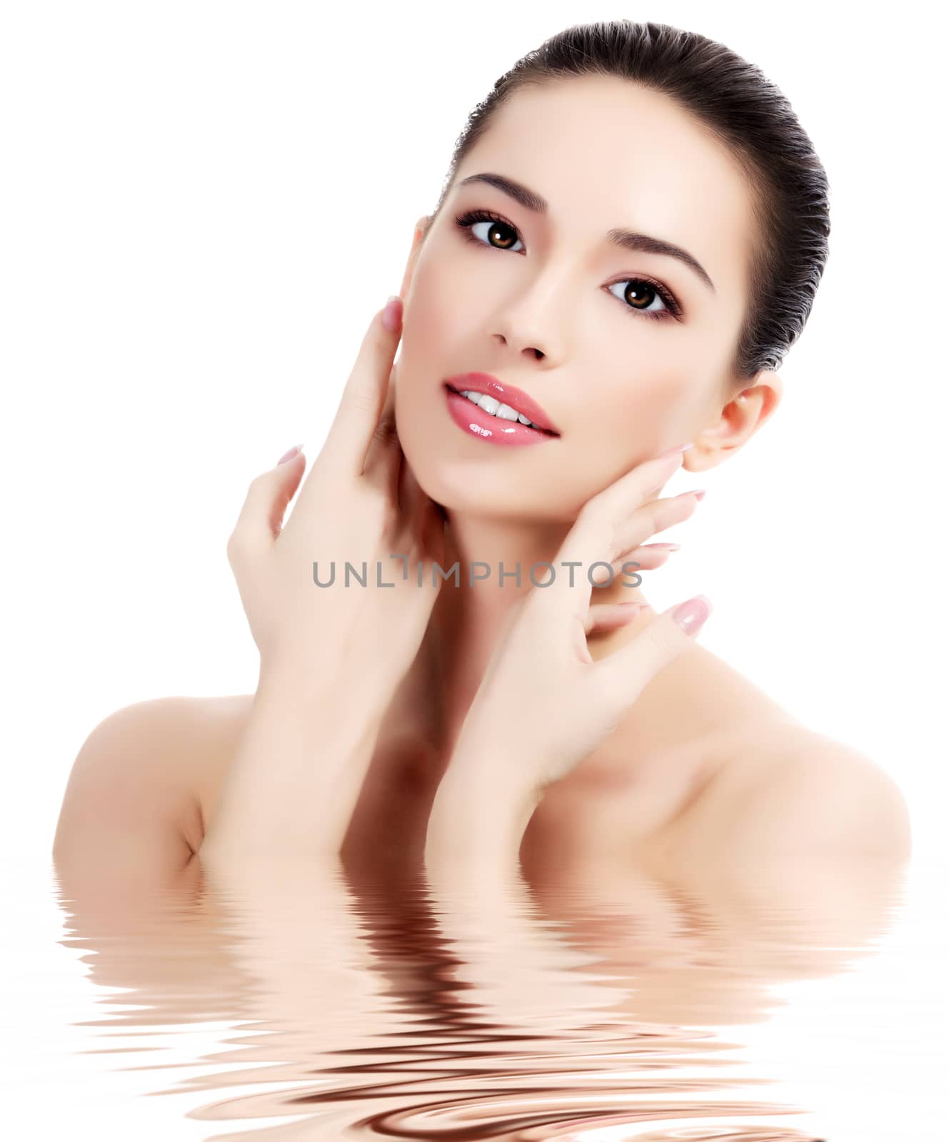Beautiful female with fresh clear skin, white background, isolated