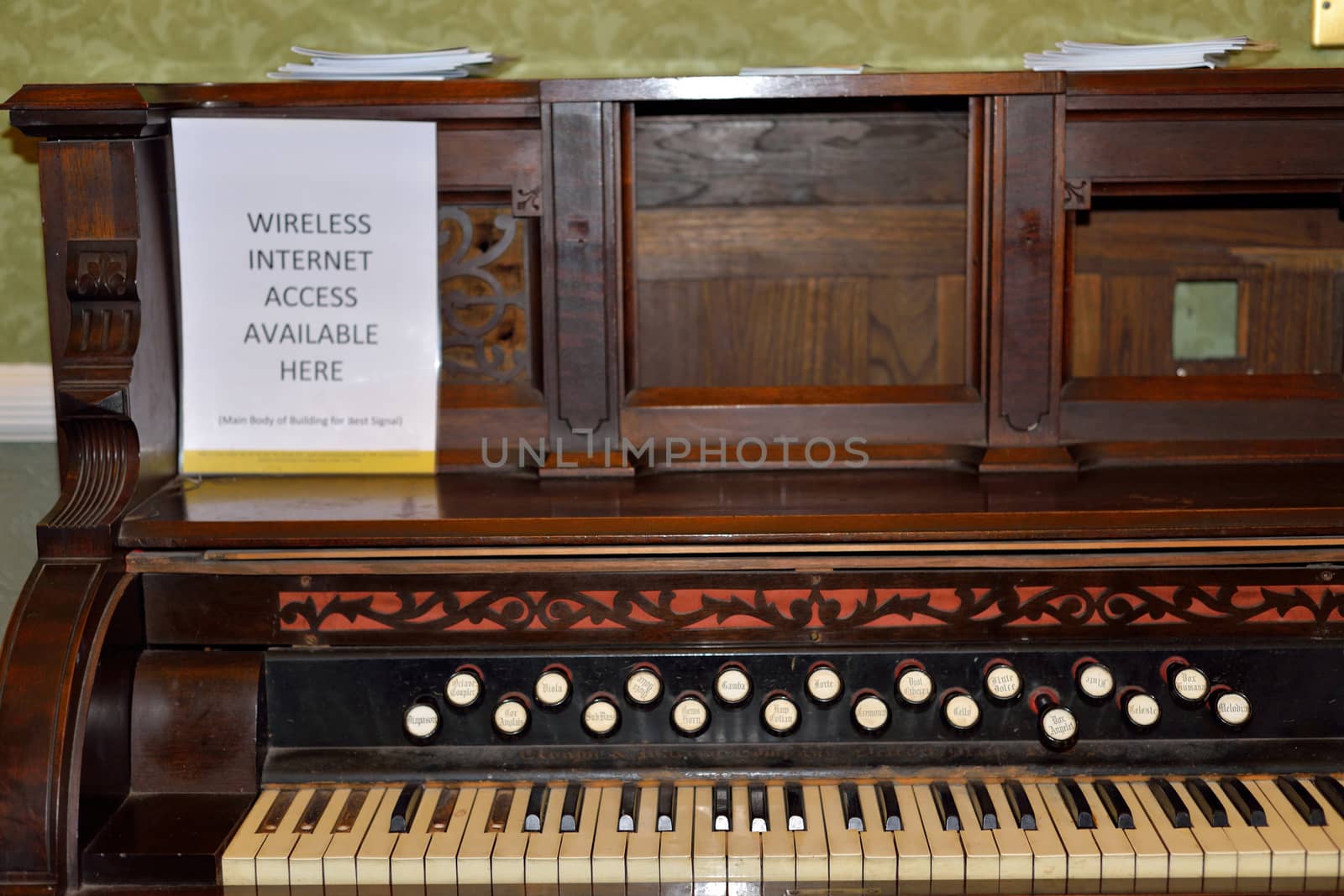 antique piano with internet access poster