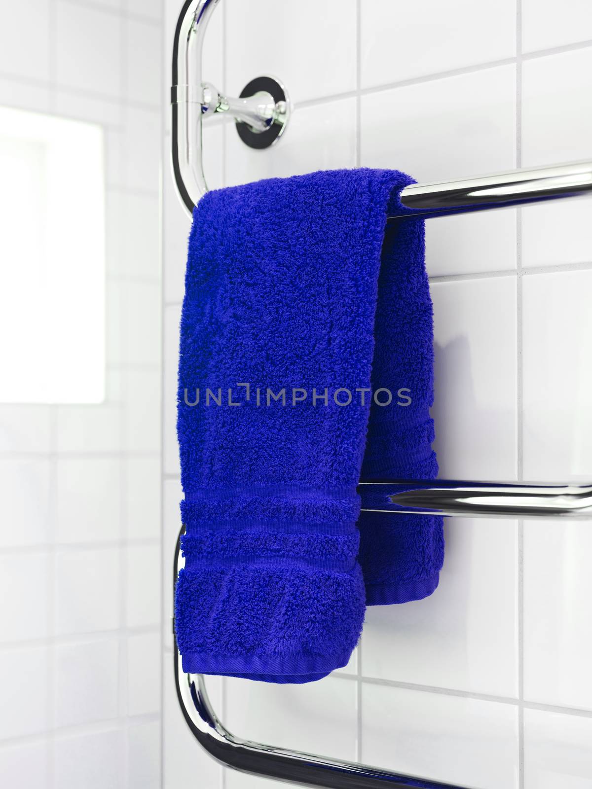 Blue towel on a dryer by gemenacom