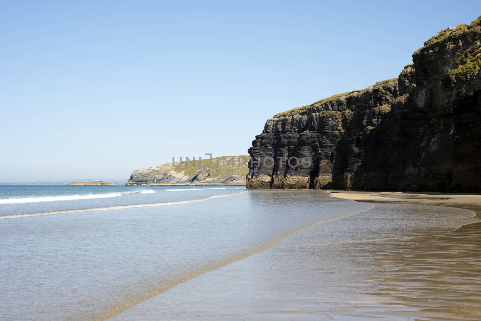 ballybunion beach and cliffs on the wild atlantic way at low tide