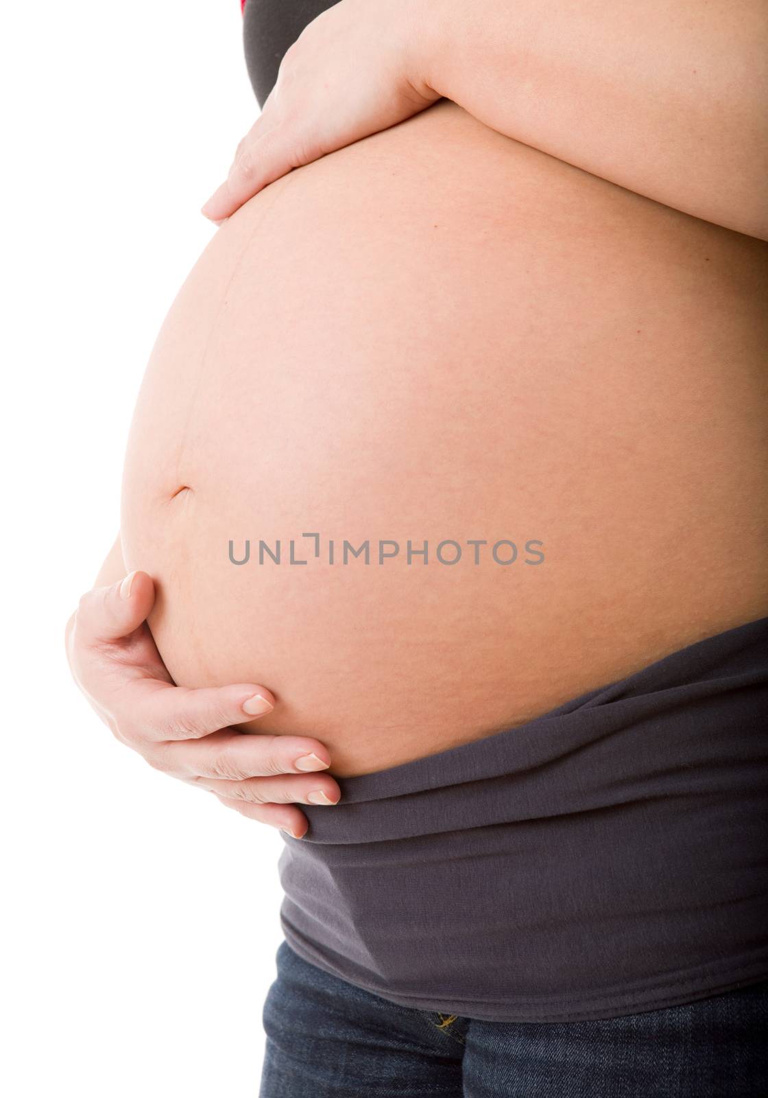 Closeup of pregnant woman at white background