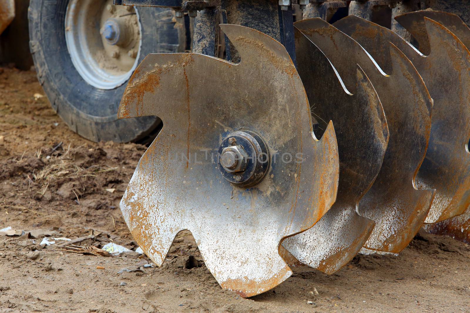 Disc harrow used to cultivate the soil. close-up 