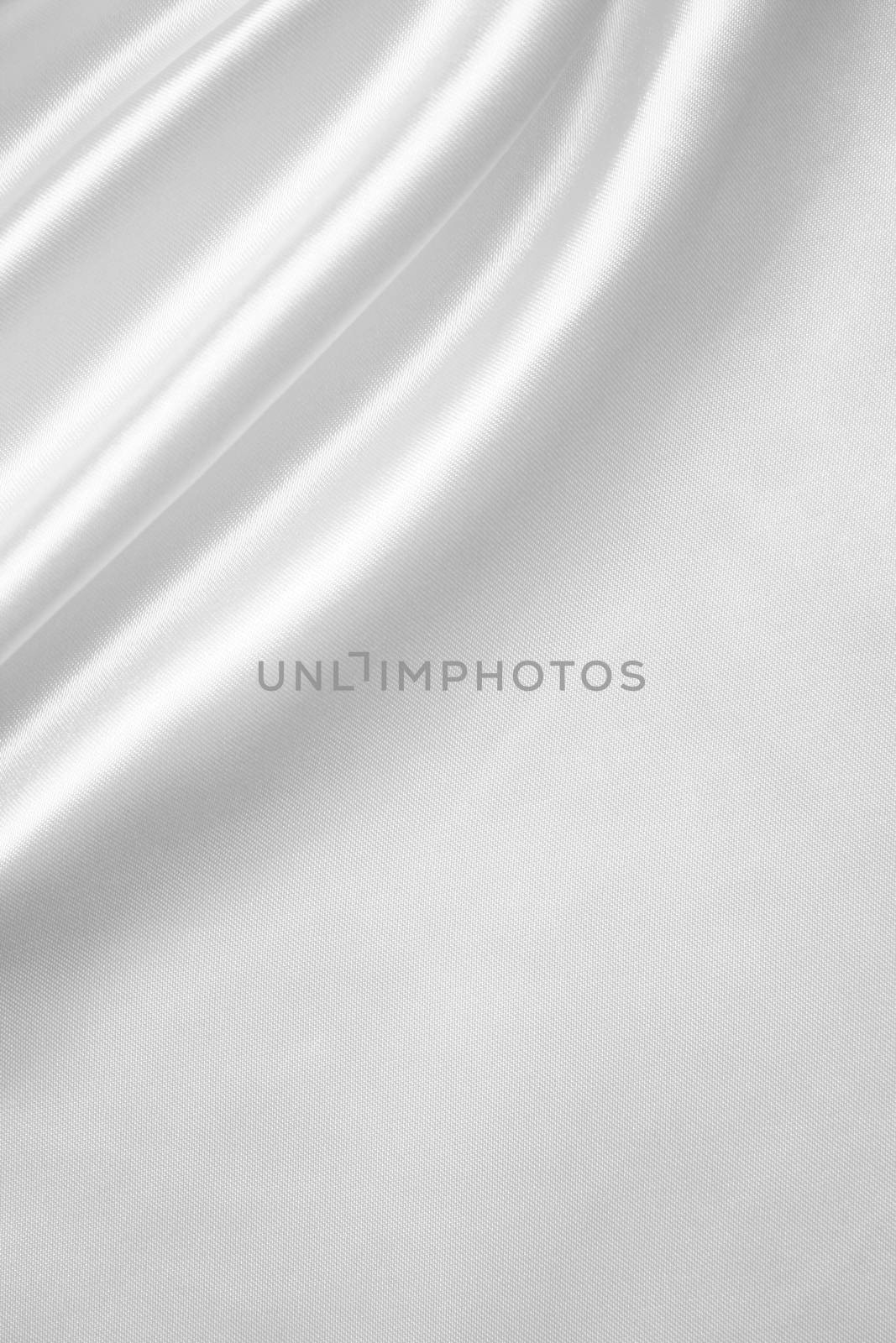 Smooth elegant white silk or satin can use as wedding background 