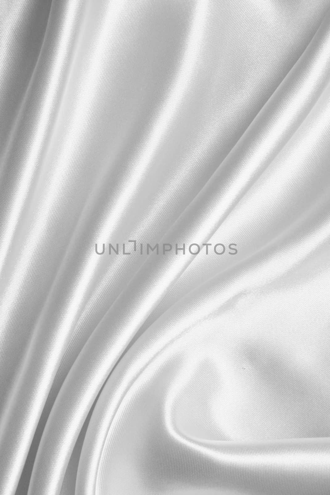 Smooth elegant white silk or satin can use as wedding background 