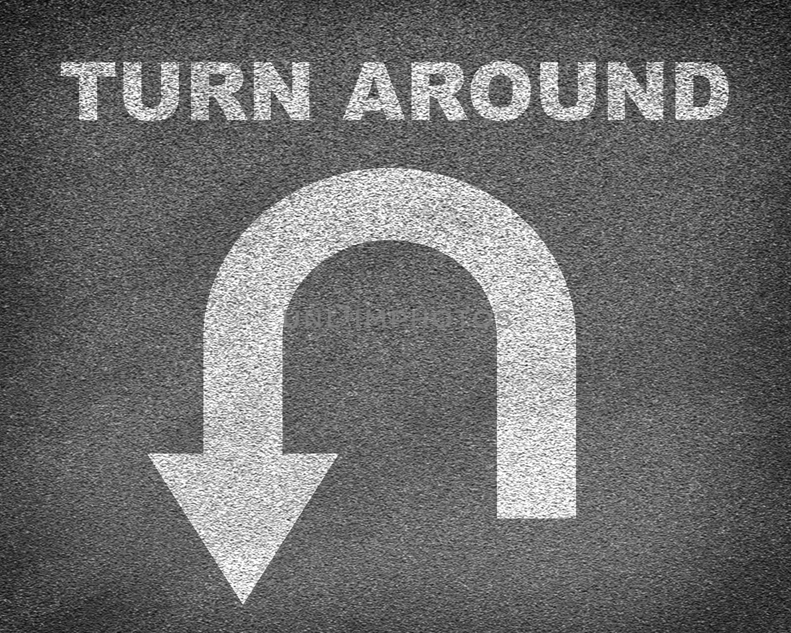 Asphalt road texture with U-turn sign and text turn around. Business concept