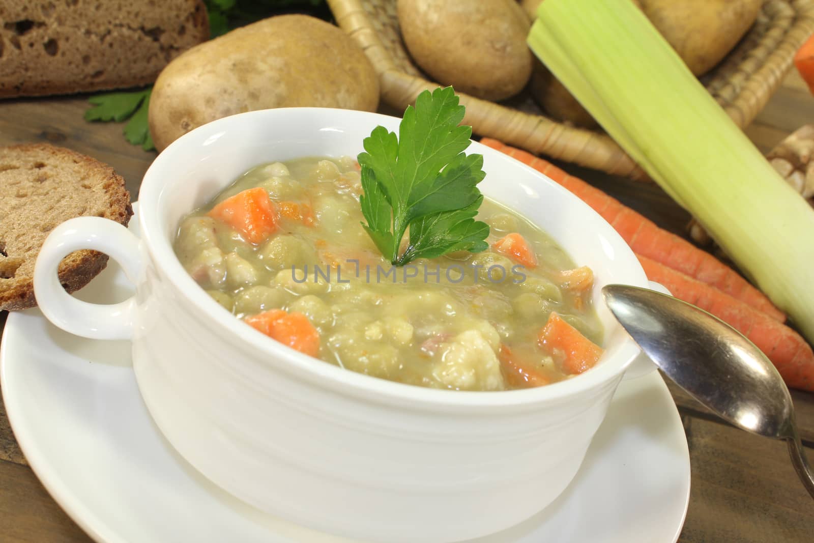 hearty pea soup with carrots and parsley