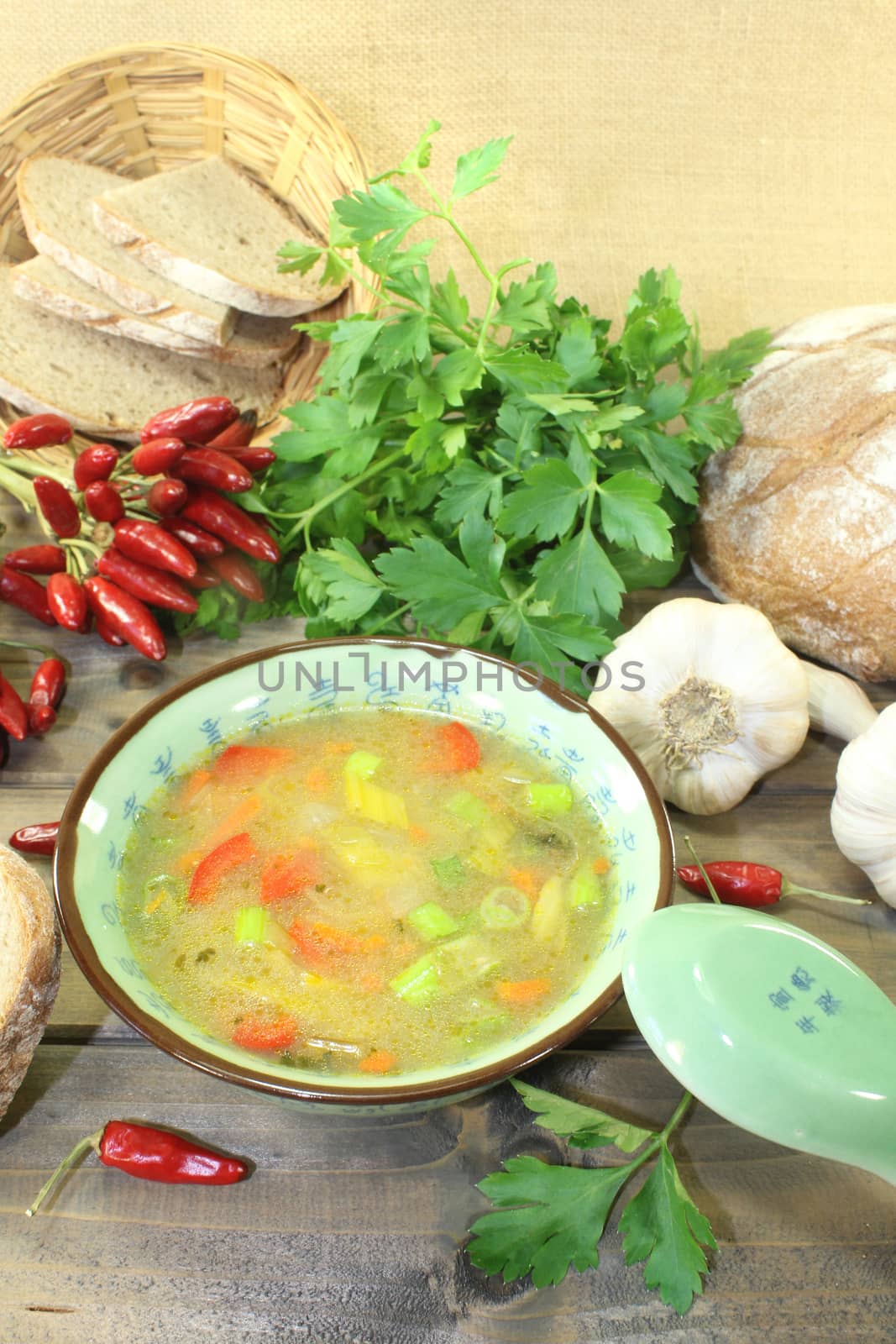 Asian chicken consomme with parsley by discovery