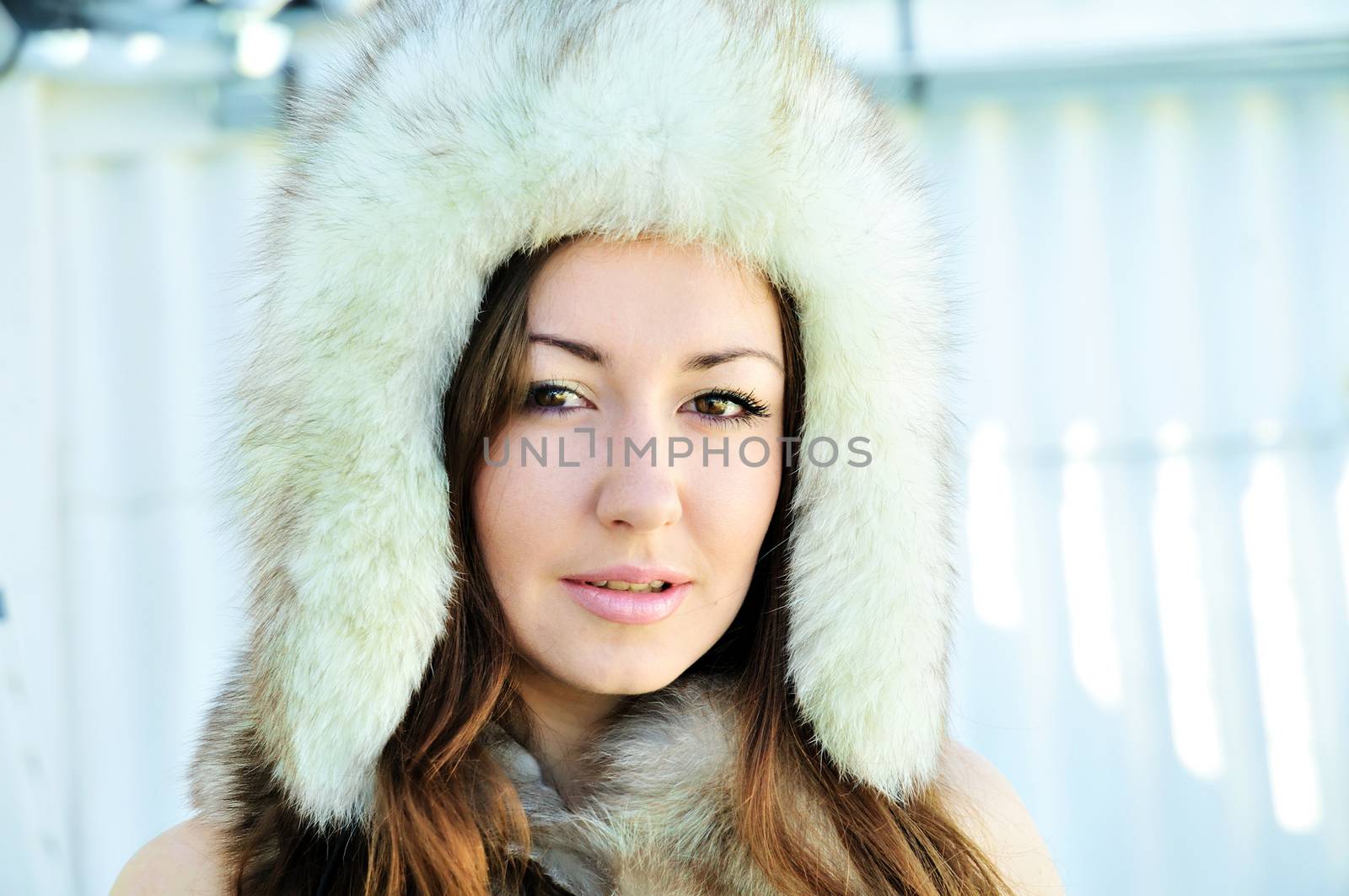 brunette girl wearing fur hat