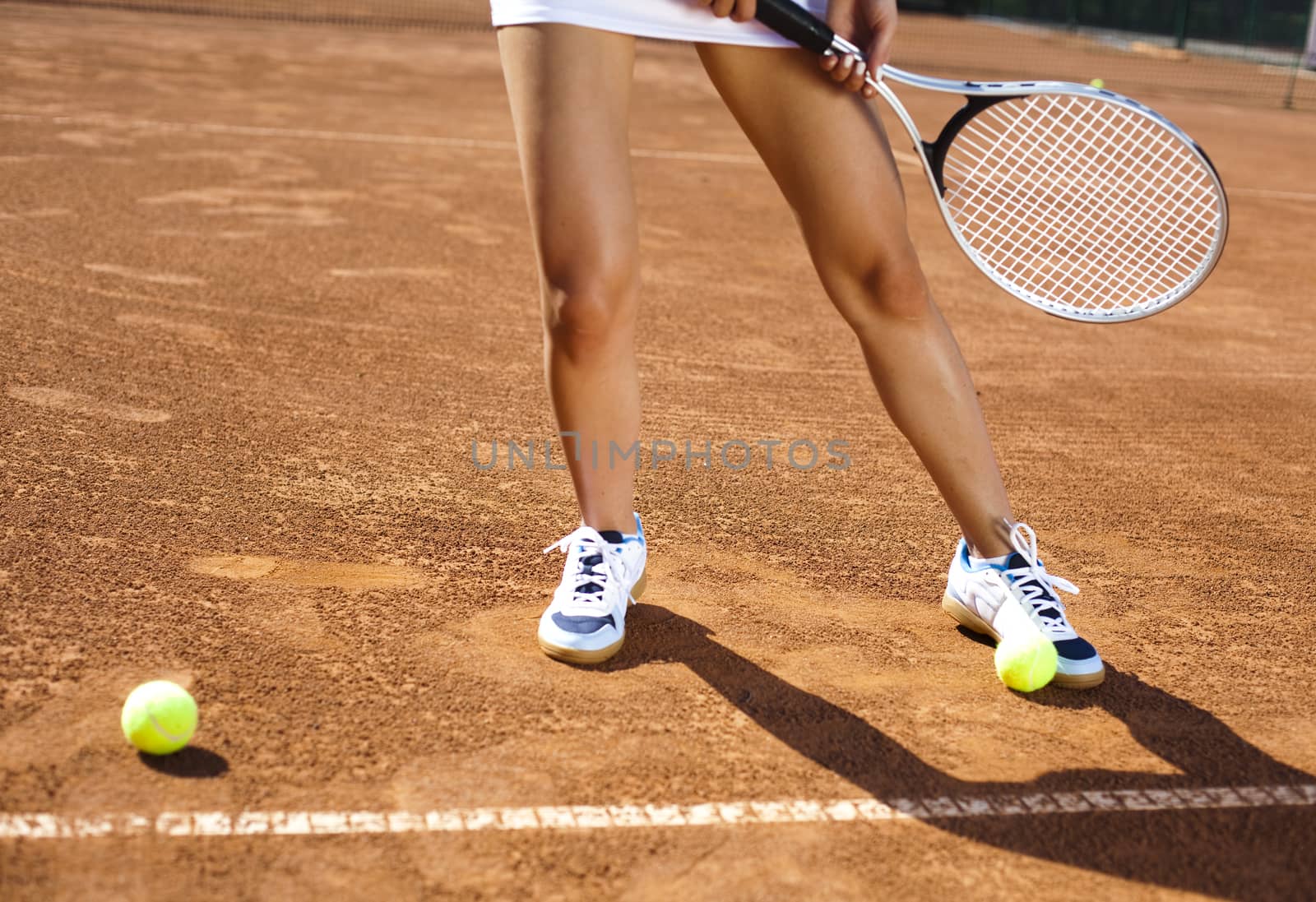 Playing tennis, summertime saturated theme by JanPietruszka