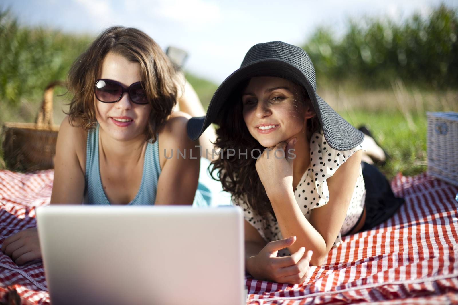 Girls on picnic, summer free time spending