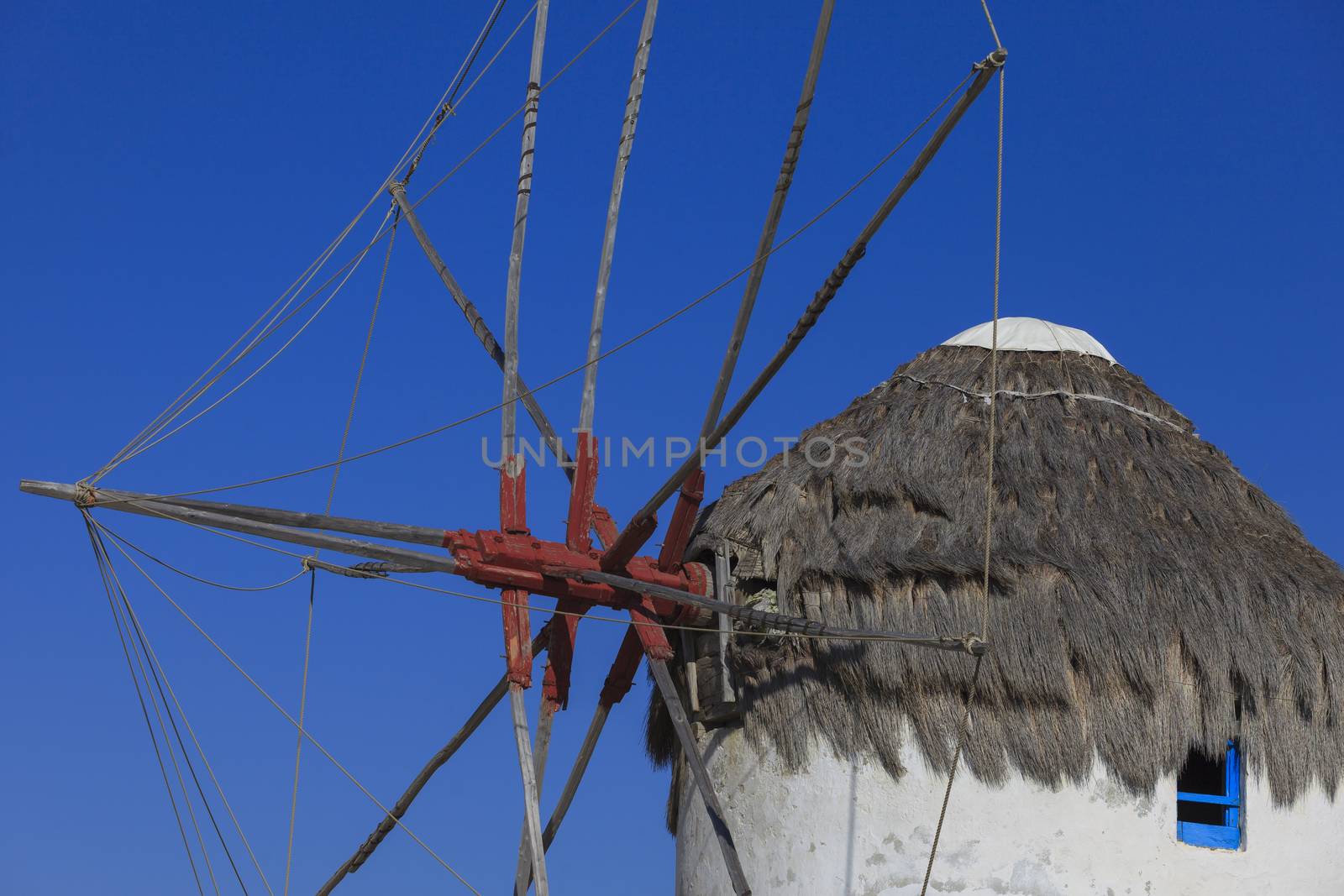 Detail of one famous windmill of Mykonos, Greece during a clear and bright summer sunny day 