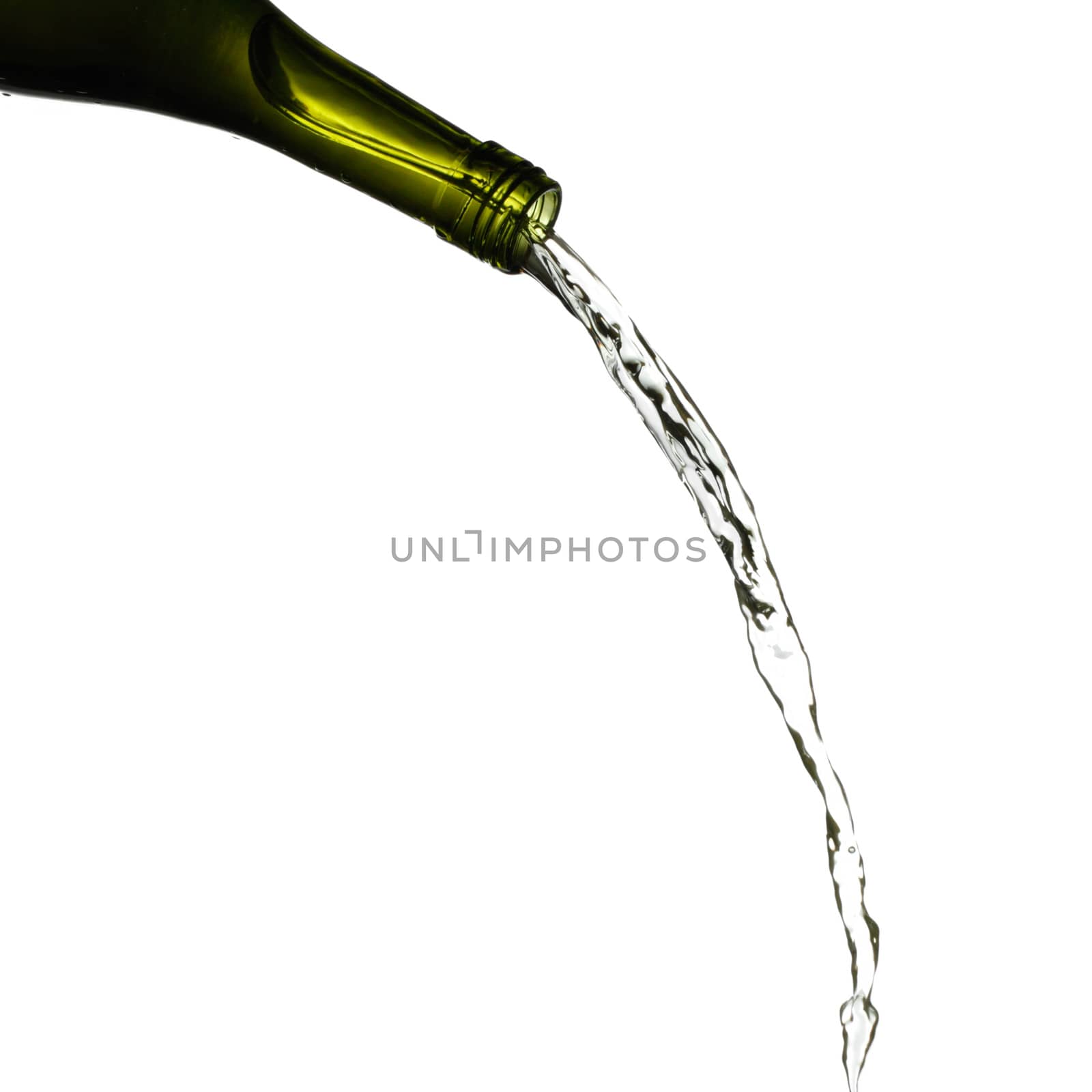 White wine pouring isolated on white background